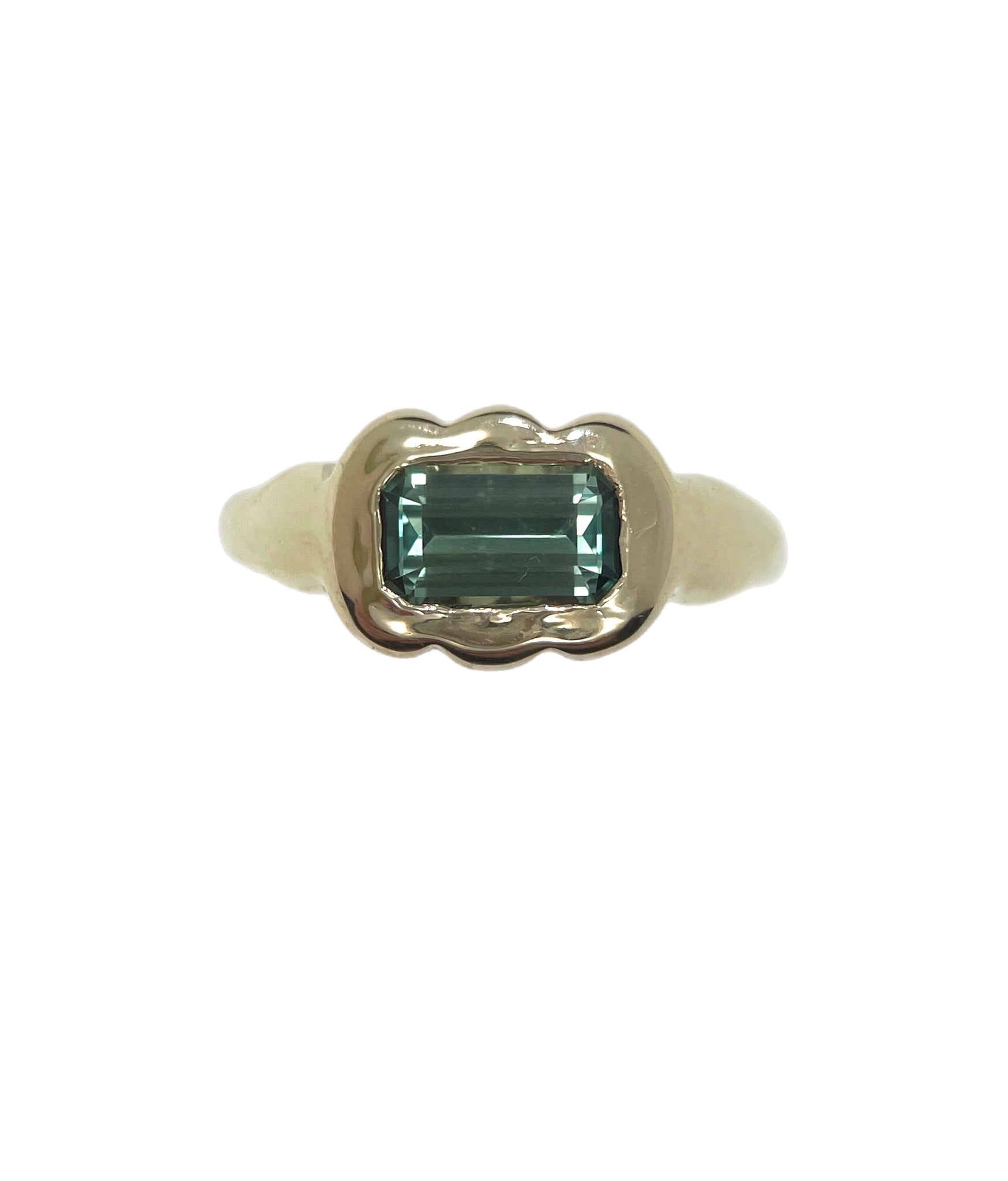 scalloped emerald cut sapphire ring