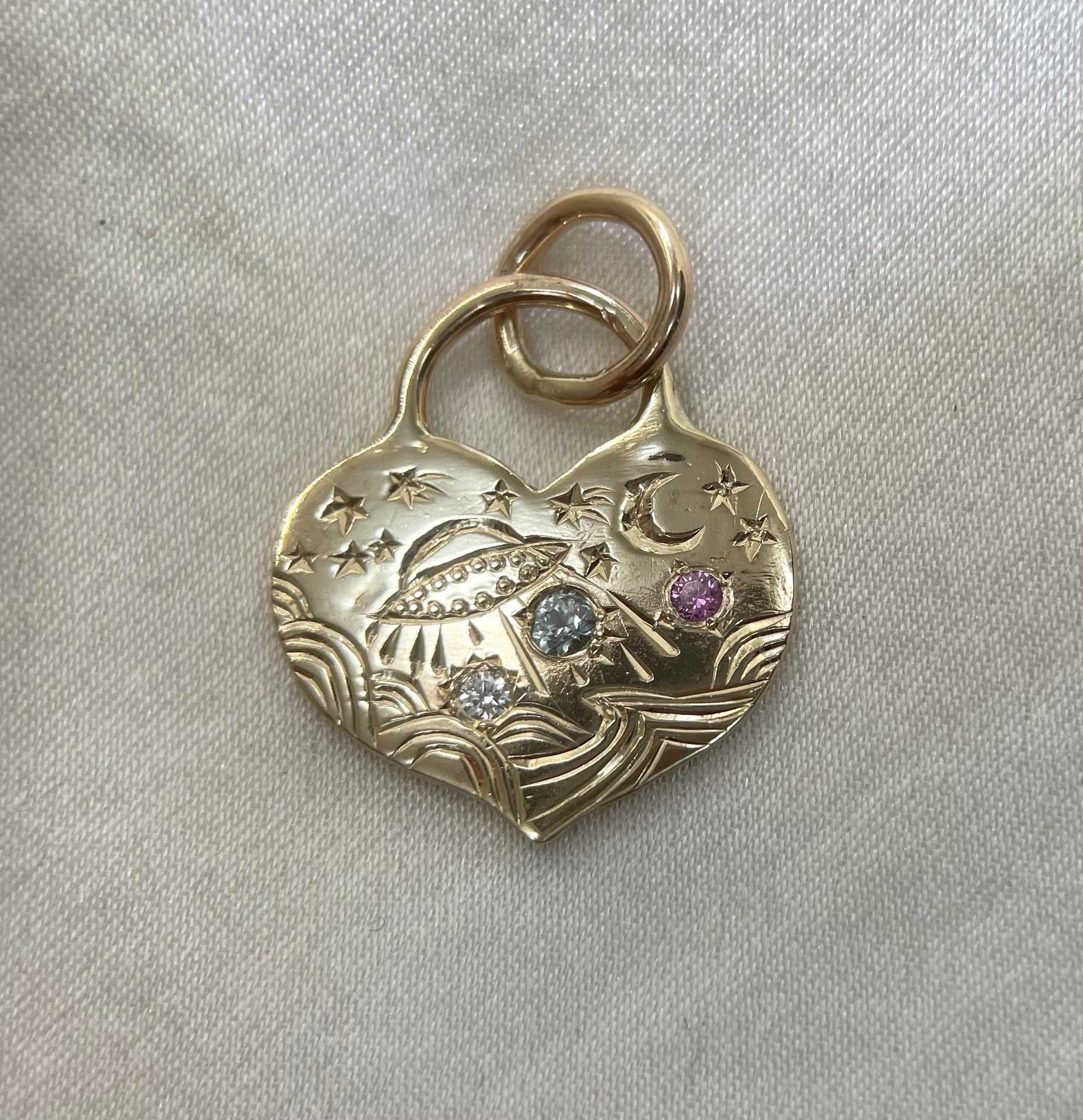 ufo sea heart pendant