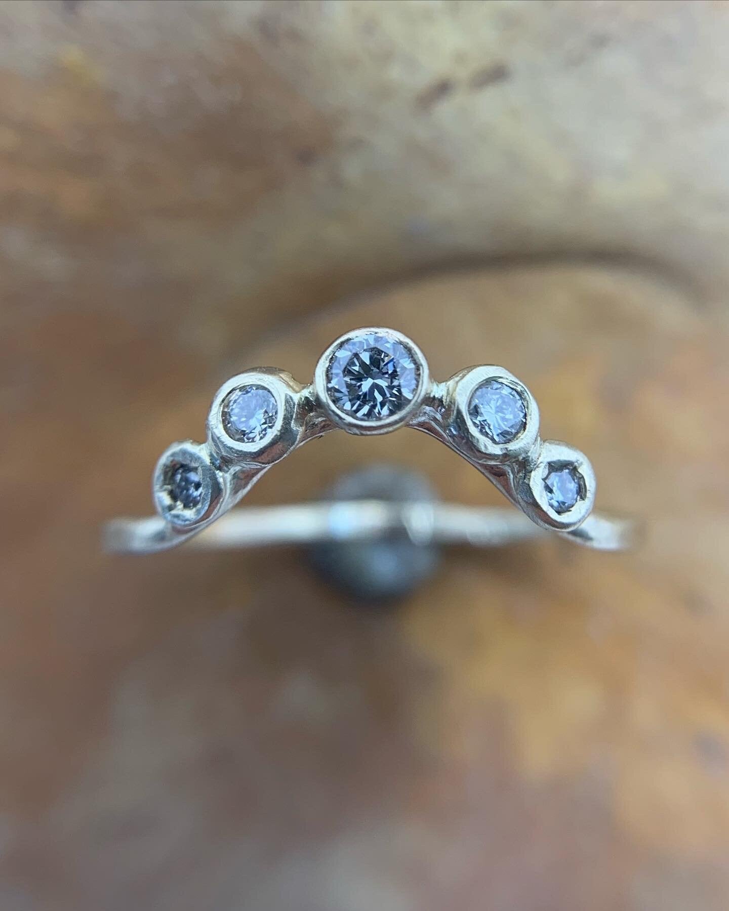 Arched diamond band